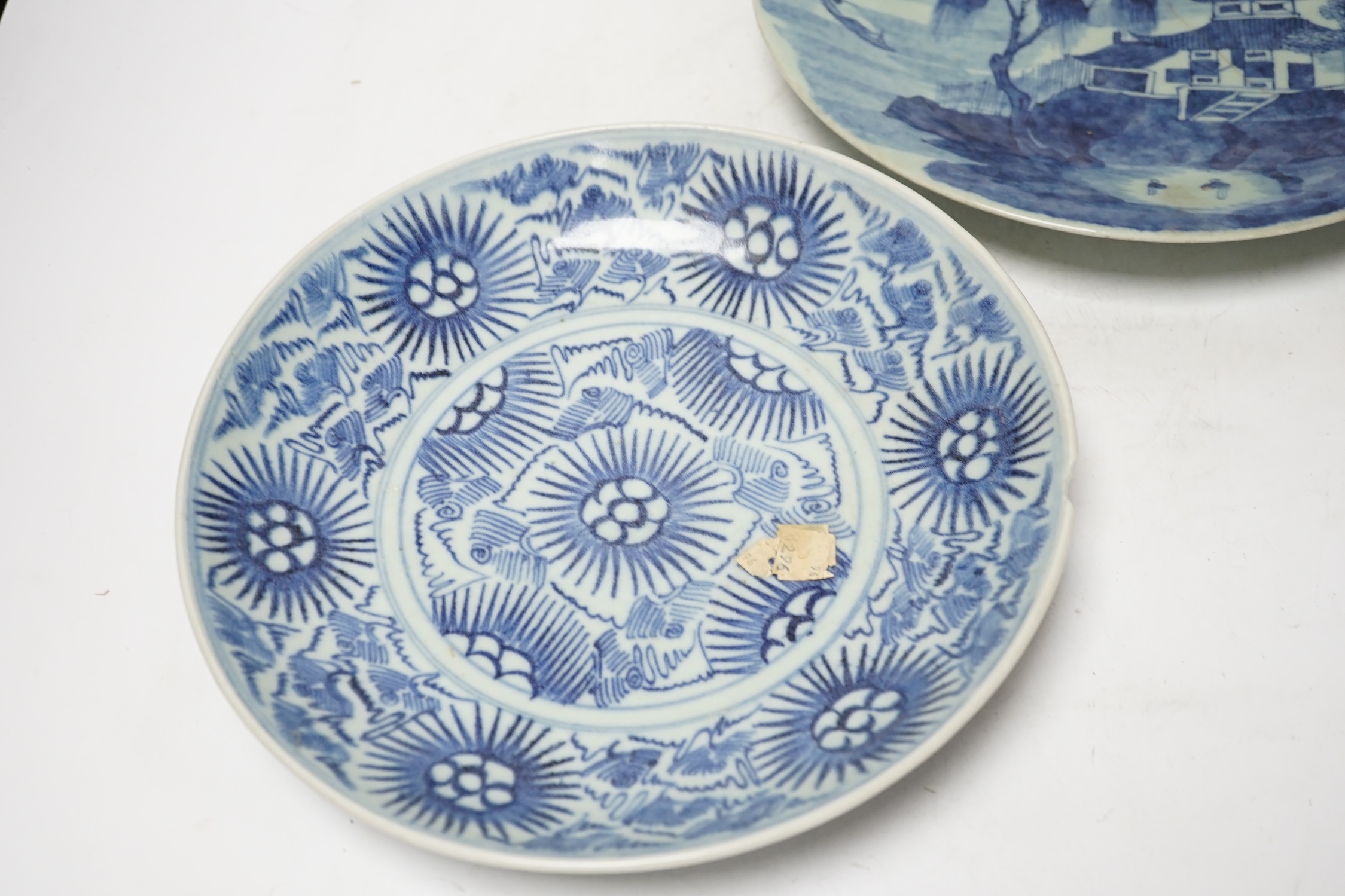 A 19th century Chinese celadon glazed blue and white landscape dish and a Diana Cargo dish, landscape dish 29.5cm diameter